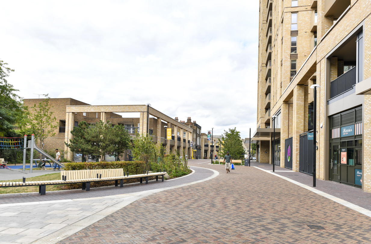 The open walkway and curved benches at Stroudley Walk