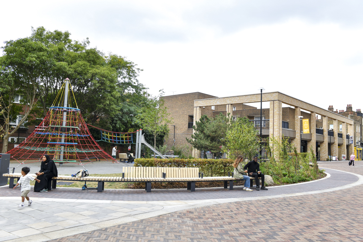 The pocket park and play area beside the shopping parade