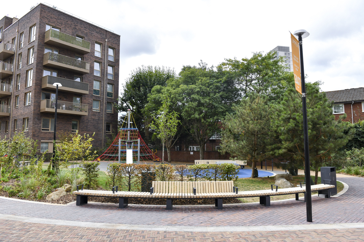 Curved seating and green spaces at Stroudley Walk